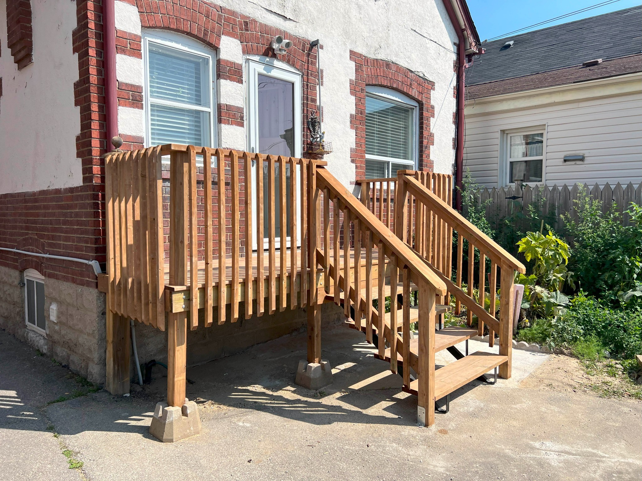 Custom cedar deck, railings and privacy carpentry